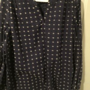 Long sleeved navy blue with white implements